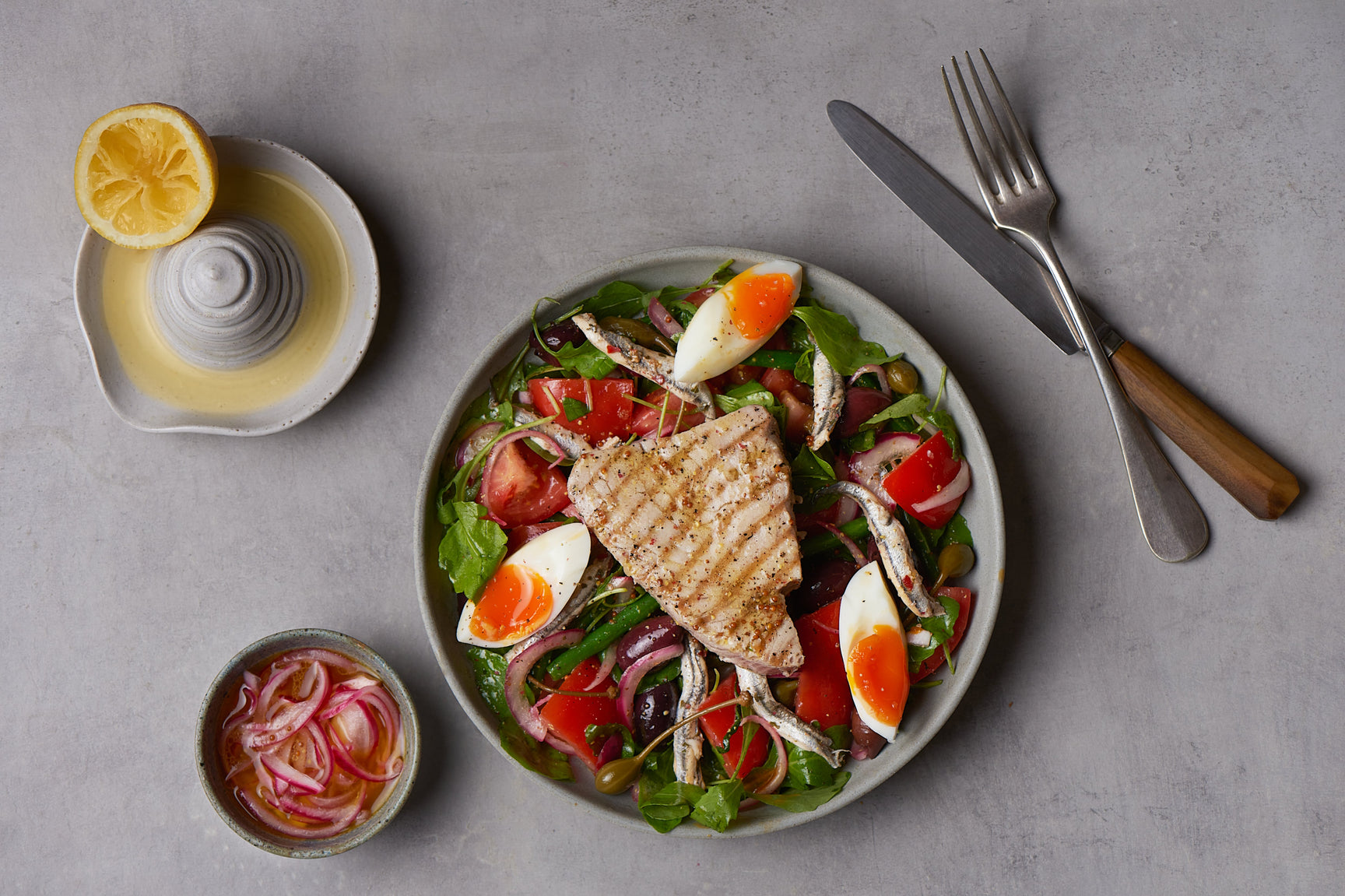 Yellowfin tuna Niçoise salad with quick pickled onions