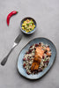 Caribbean-style sockeye salmon fillets with wild rice and a mango and avocado salsa