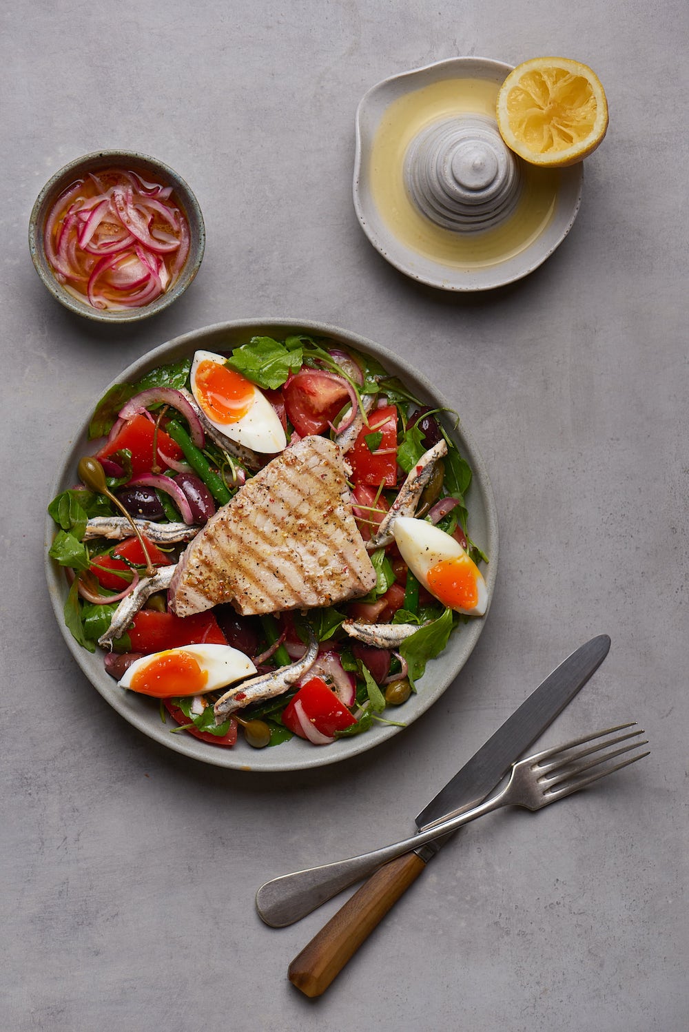 Yellowfin tuna Niçoise salad with quick pickled onions